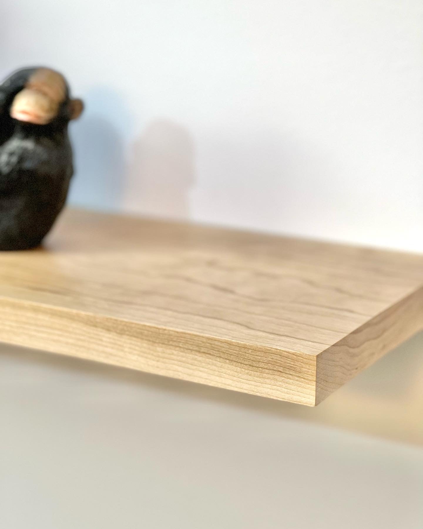 cherry floating shelves